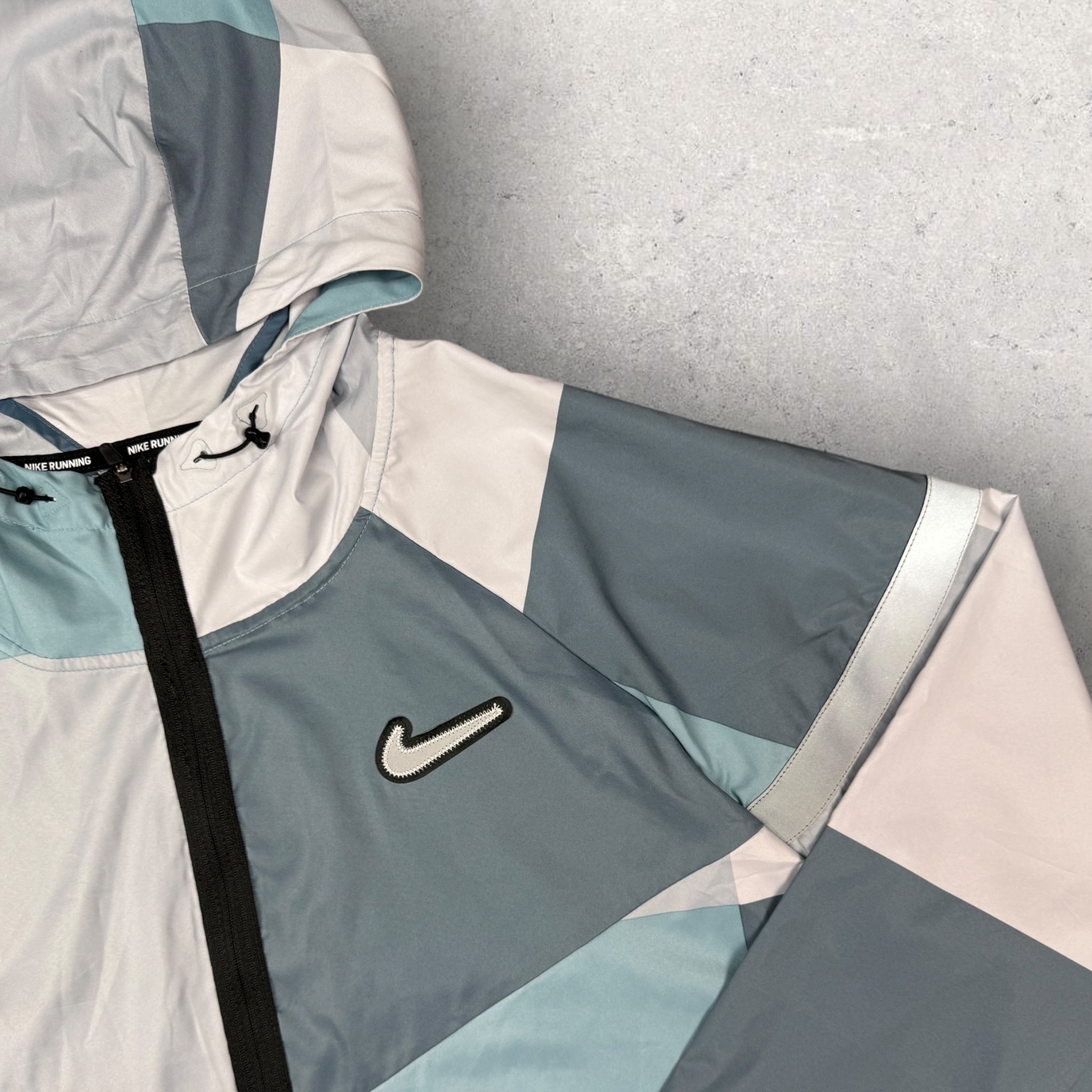 NIKE EXCLUSIVE PATCHWORK JACKET - BLUE