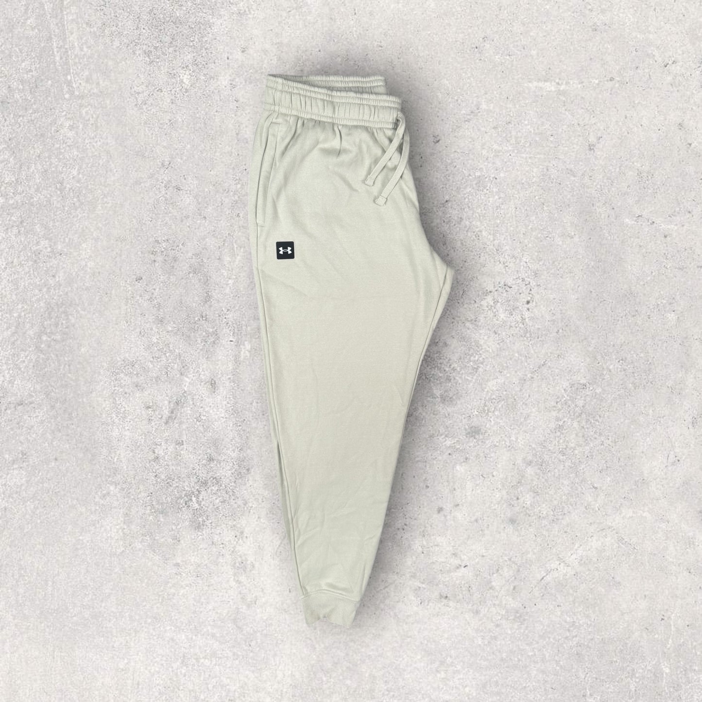UNDER ARMOUR RIVAL FLEECE JOGGER - BEIGE