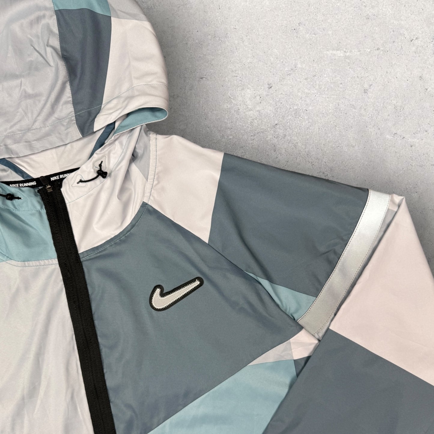 NIKE EXCLUSIVE PATCHWORK JACKET - BLUE